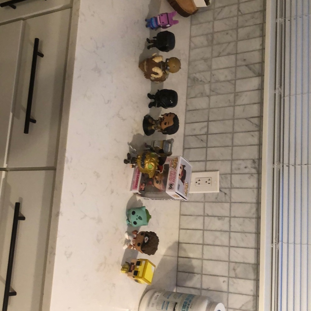 11 funko pops high in value the funko guy leaning on lord Licorice can not stand